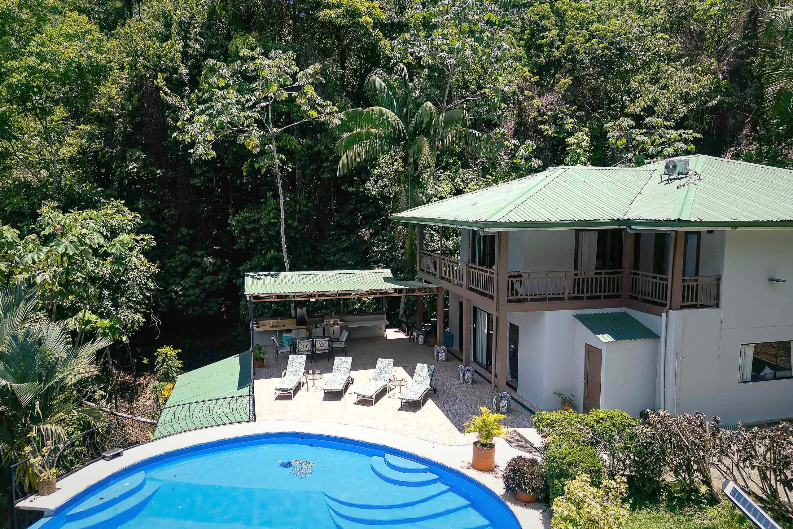 Aerial view of Casa Mariposa: pool, rancho and rainforest