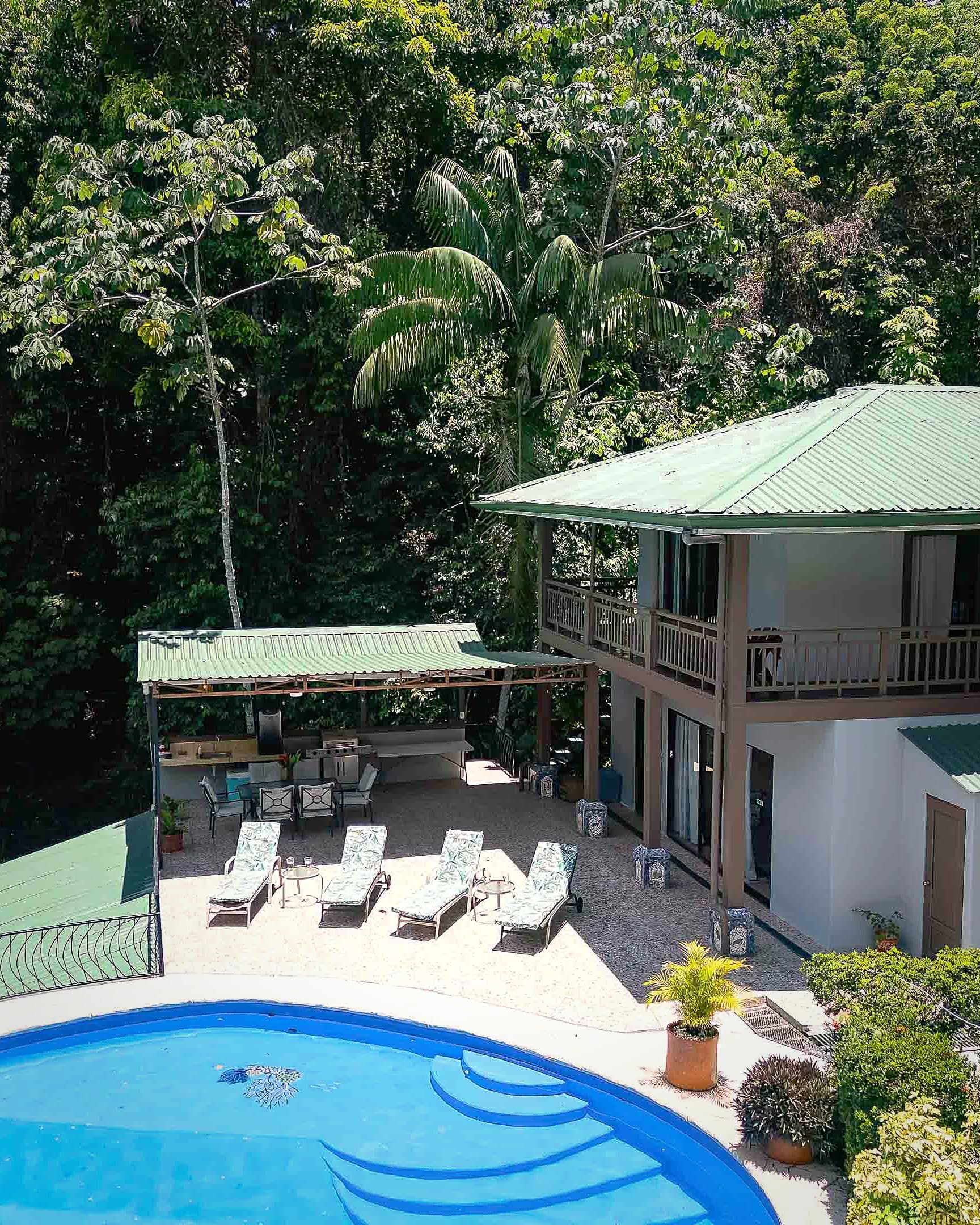 Aerial view of Casa Mariposa: pool, rancho and rainforest